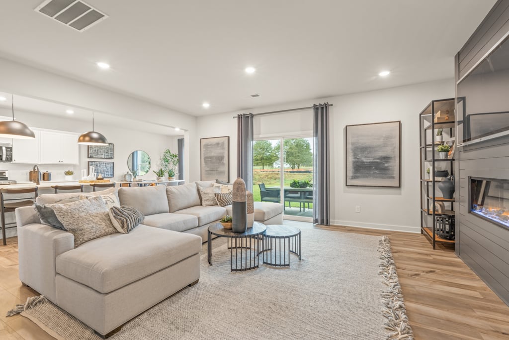 A living room with a large window.