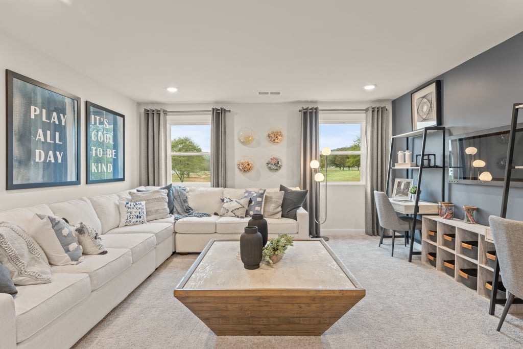 A living room with a large glass door.