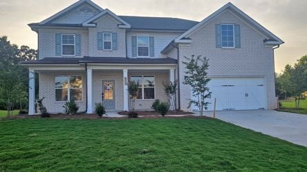 A house with a large front yard.