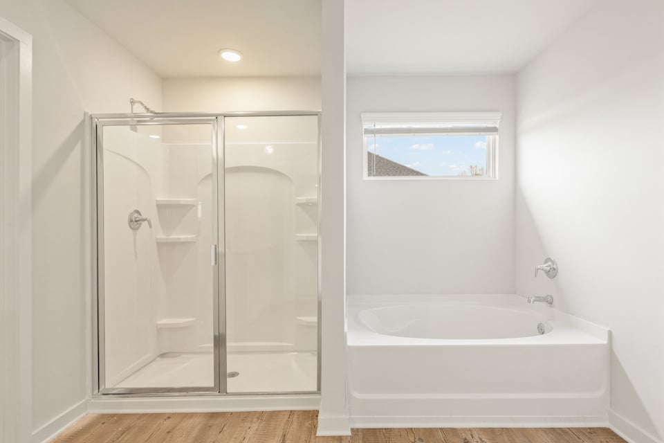 A bathroom with a glass shower.