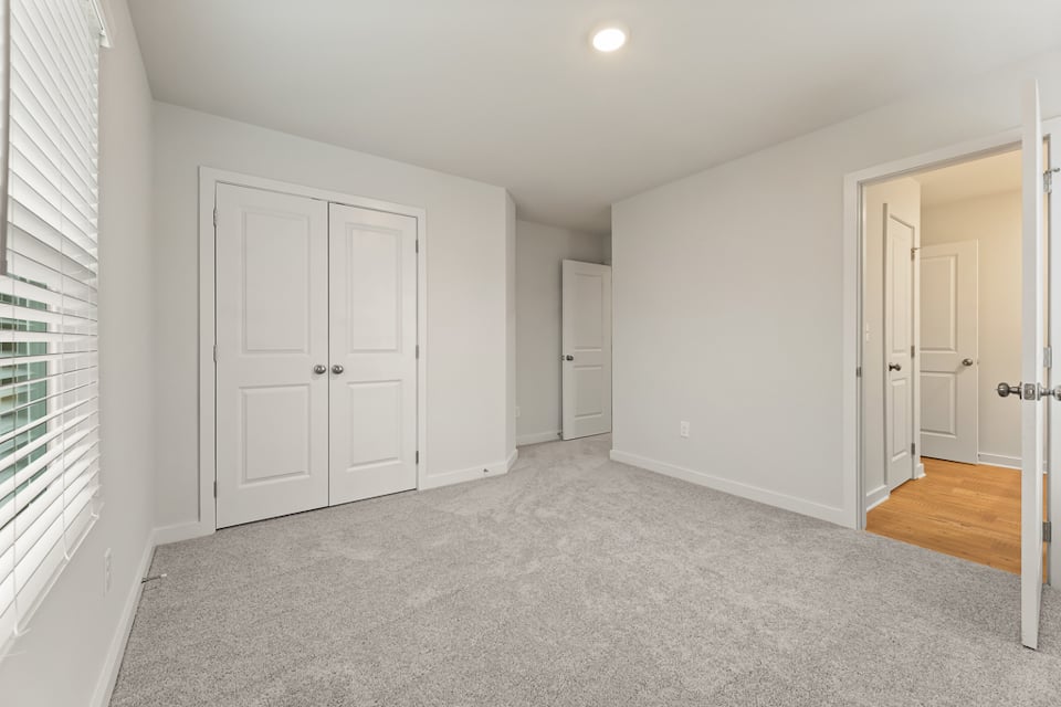 A room with white doors.