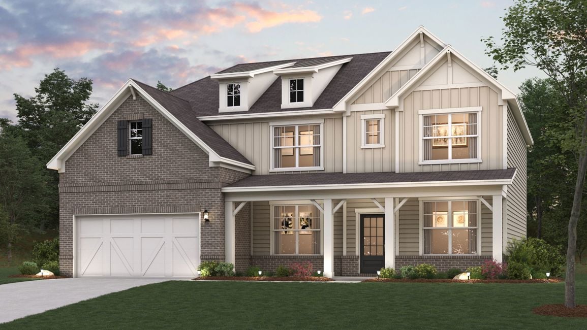 A house with a lawn in front.