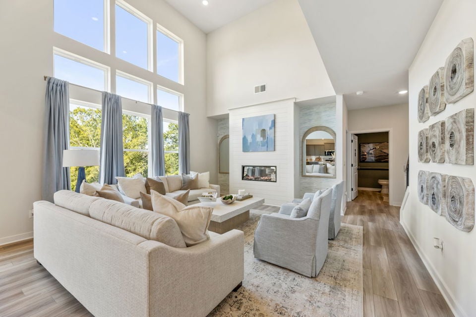 A living room with a large window.