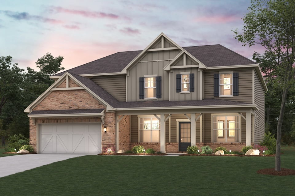 A house with a large front yard.