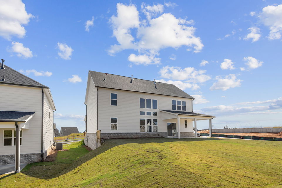 A house with a fence around it.