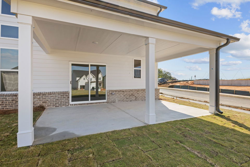 A house with a glass front door.