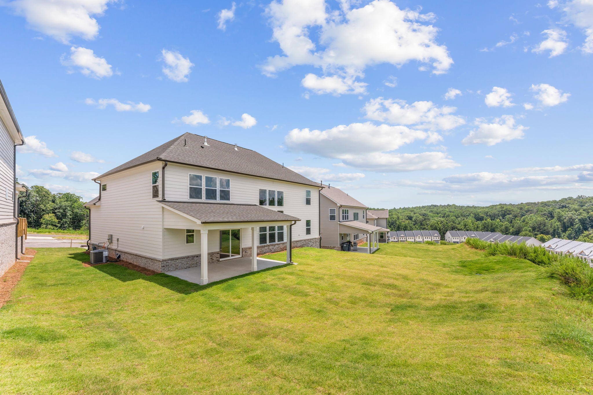 A house with a large lawn.