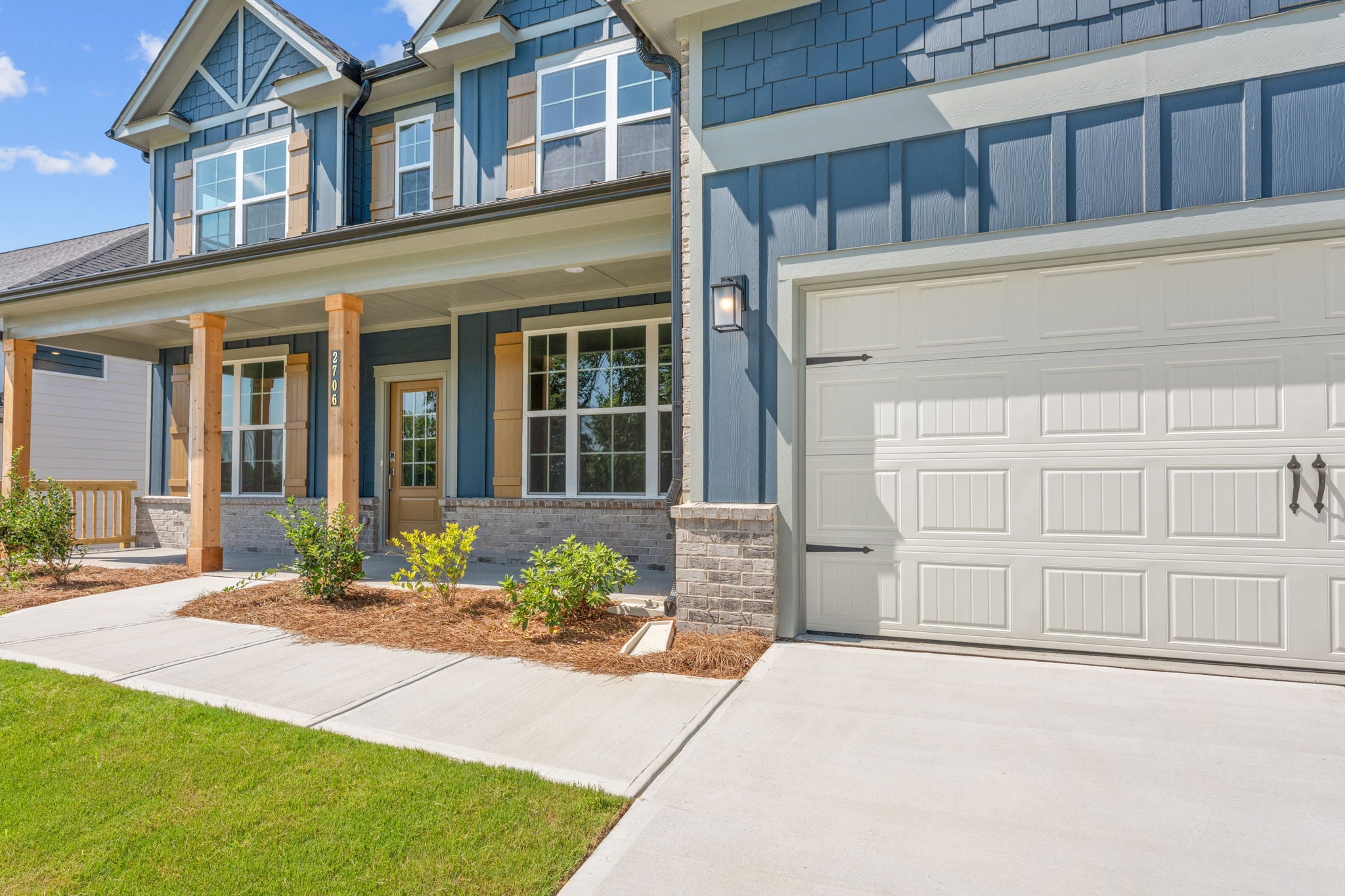 A building with a front yard.
