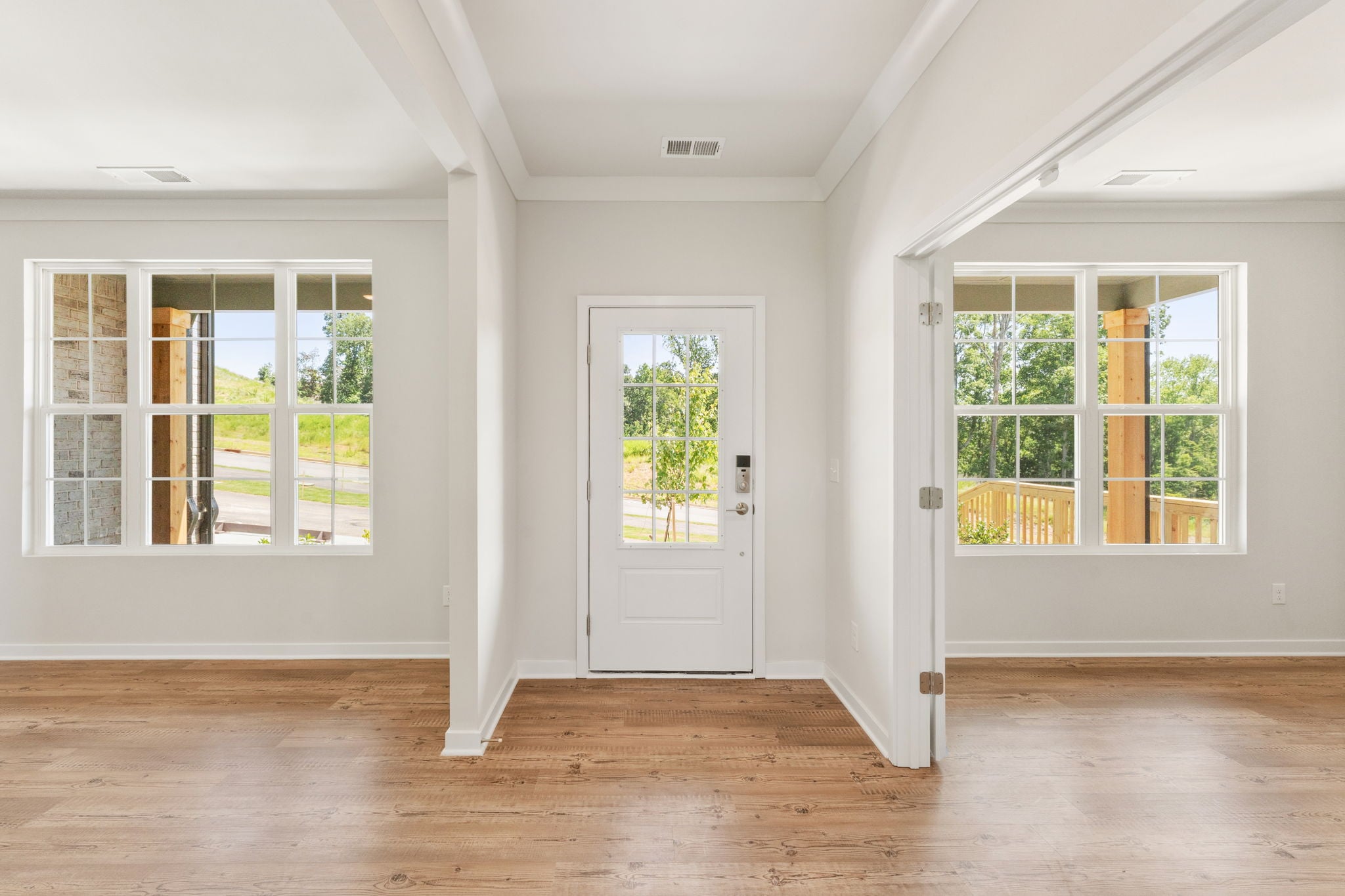 A room with white doors and windows.