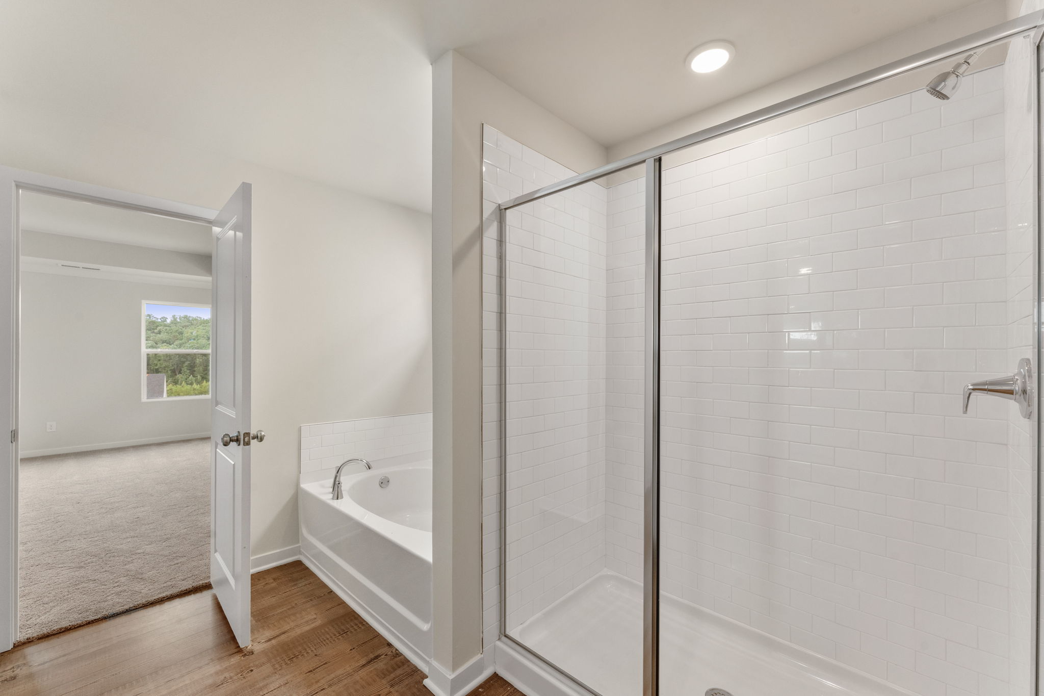 A bathroom with a glass shower.