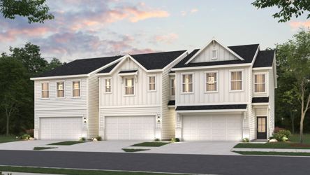 A large house with a driveway.