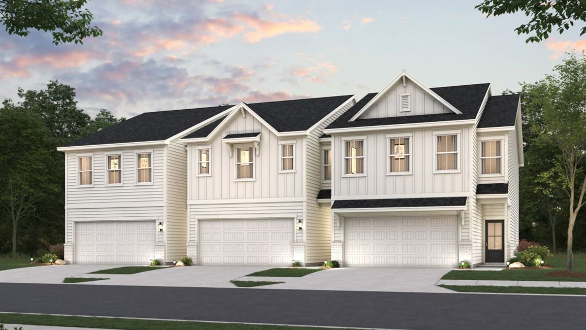 A large house with a driveway.