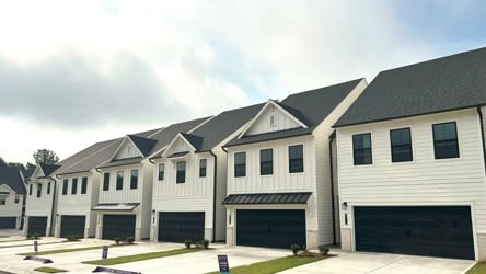 A large house with garages.