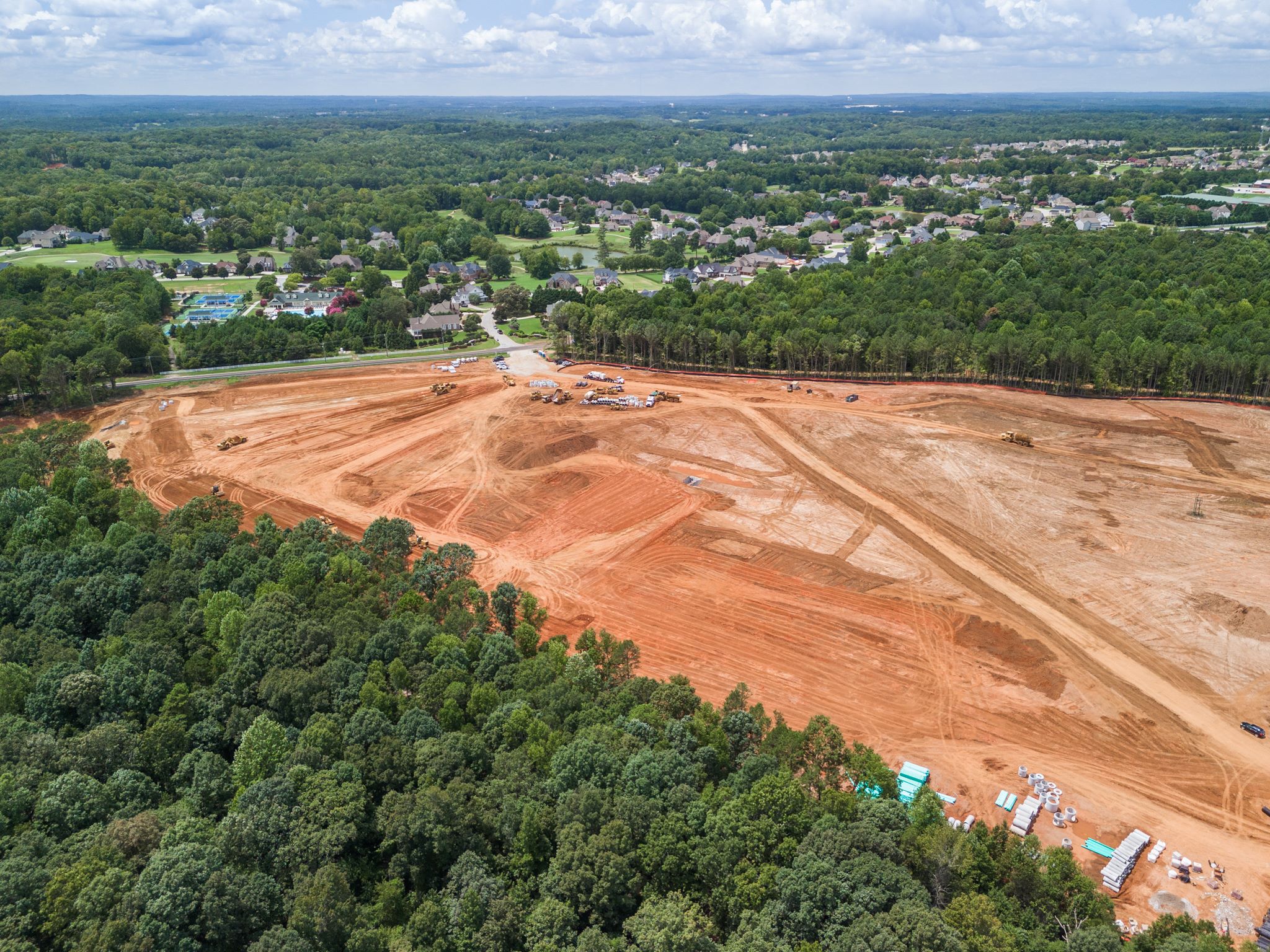 A landscape with trees and buildings.