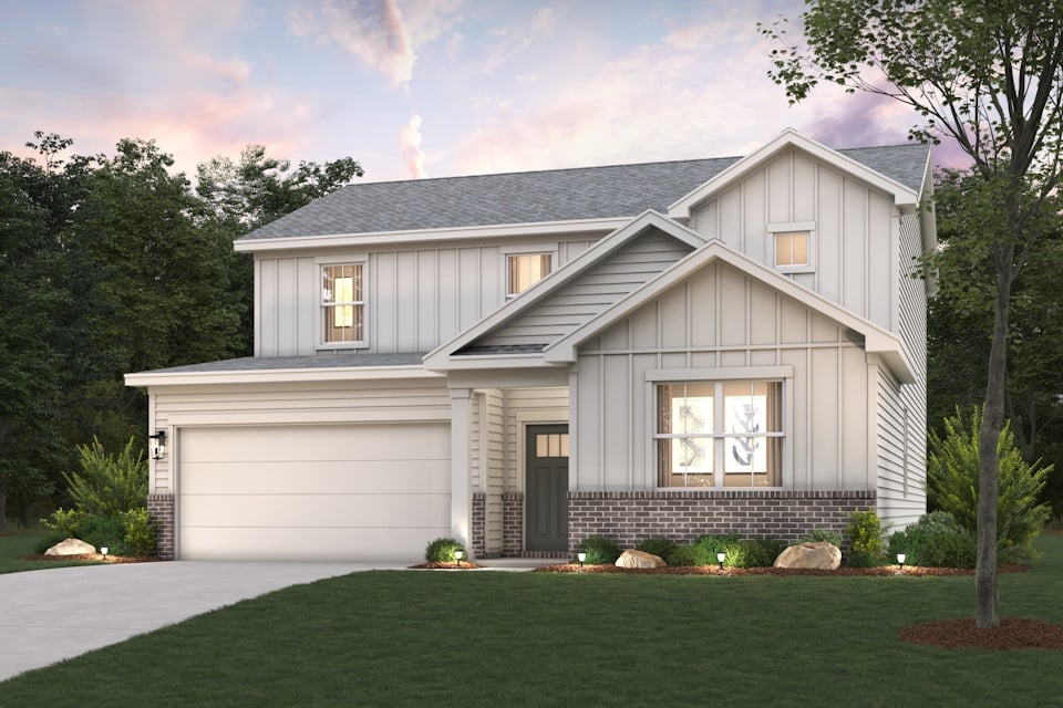A house with a large front yard.
