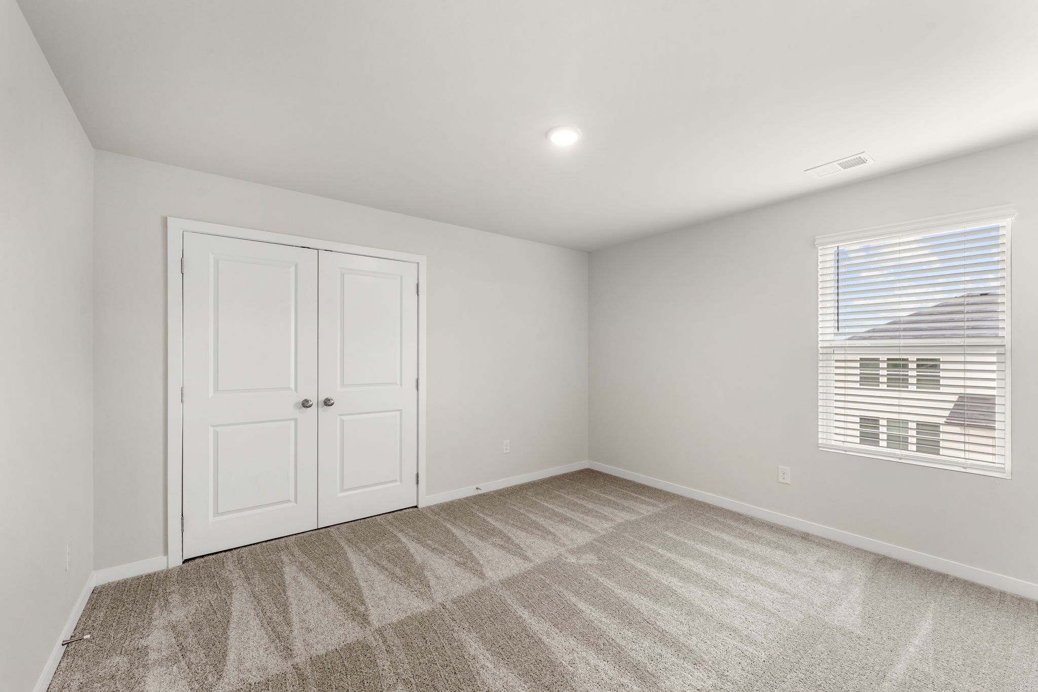 A room with white doors.