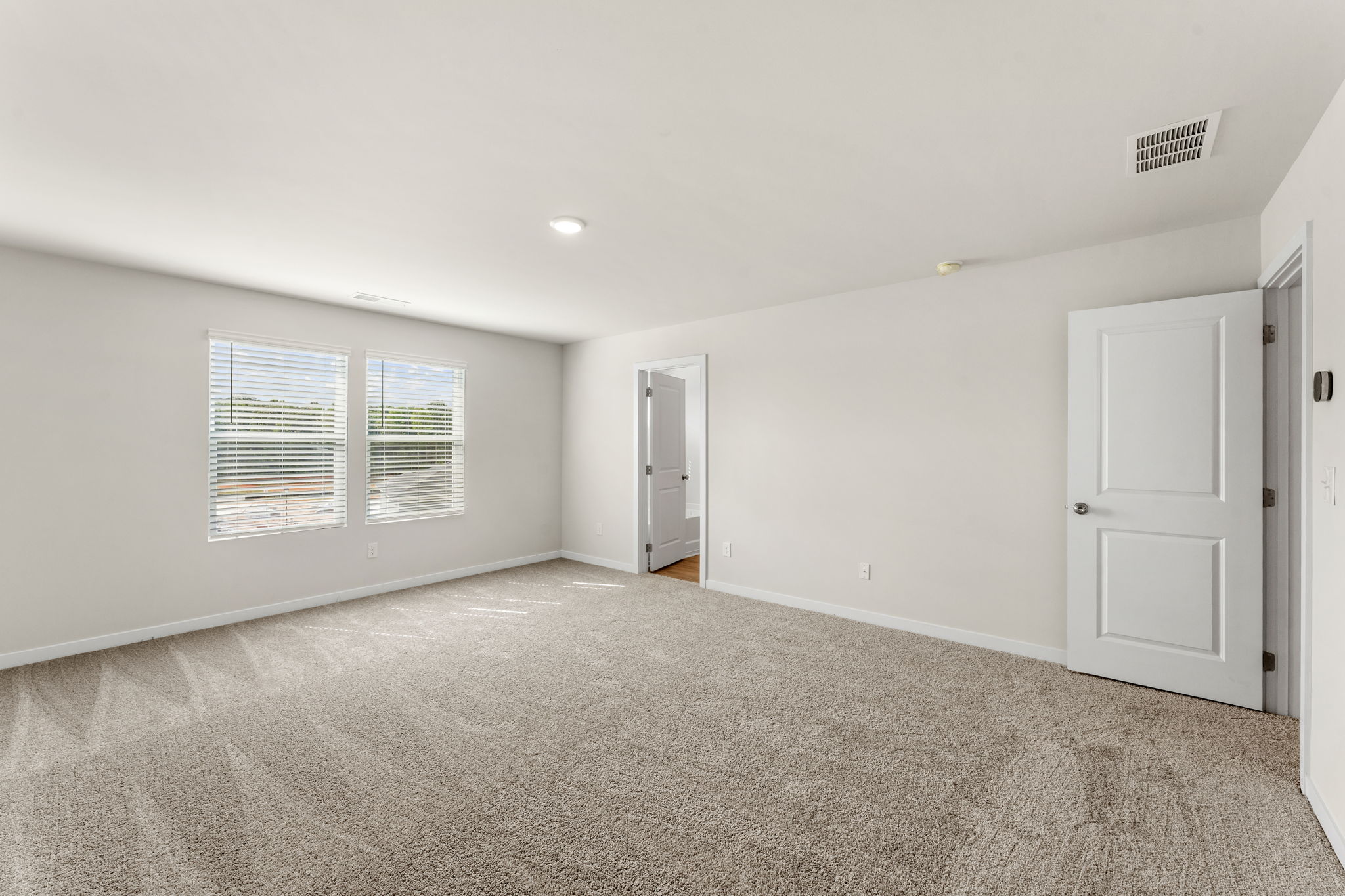 A room with white doors.