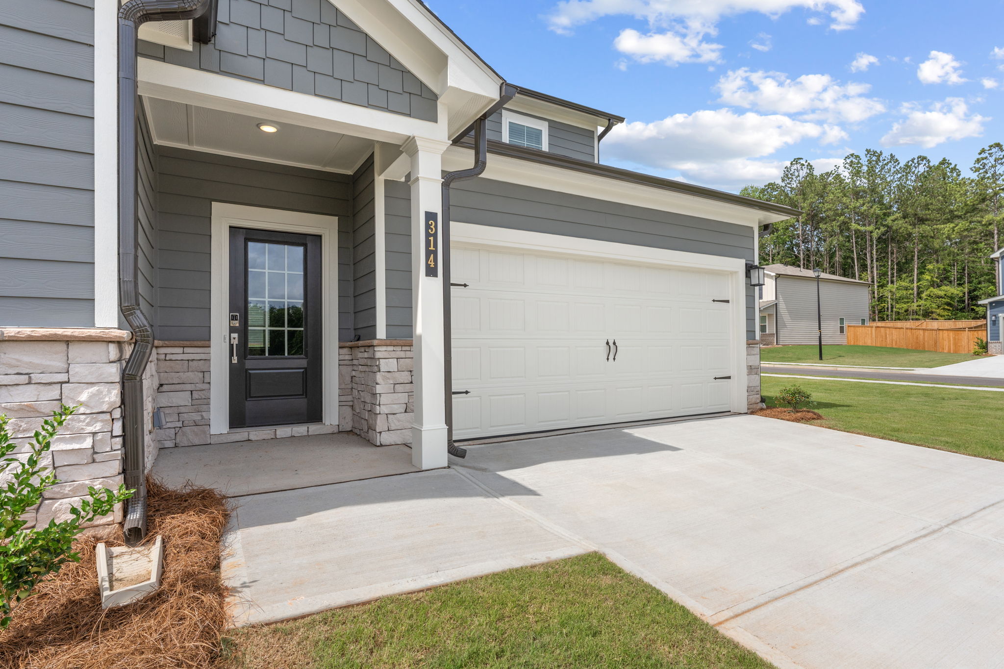 A garage and a house.