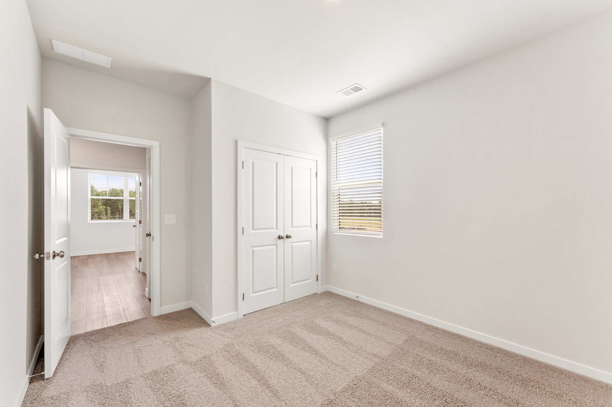 A room with white doors.