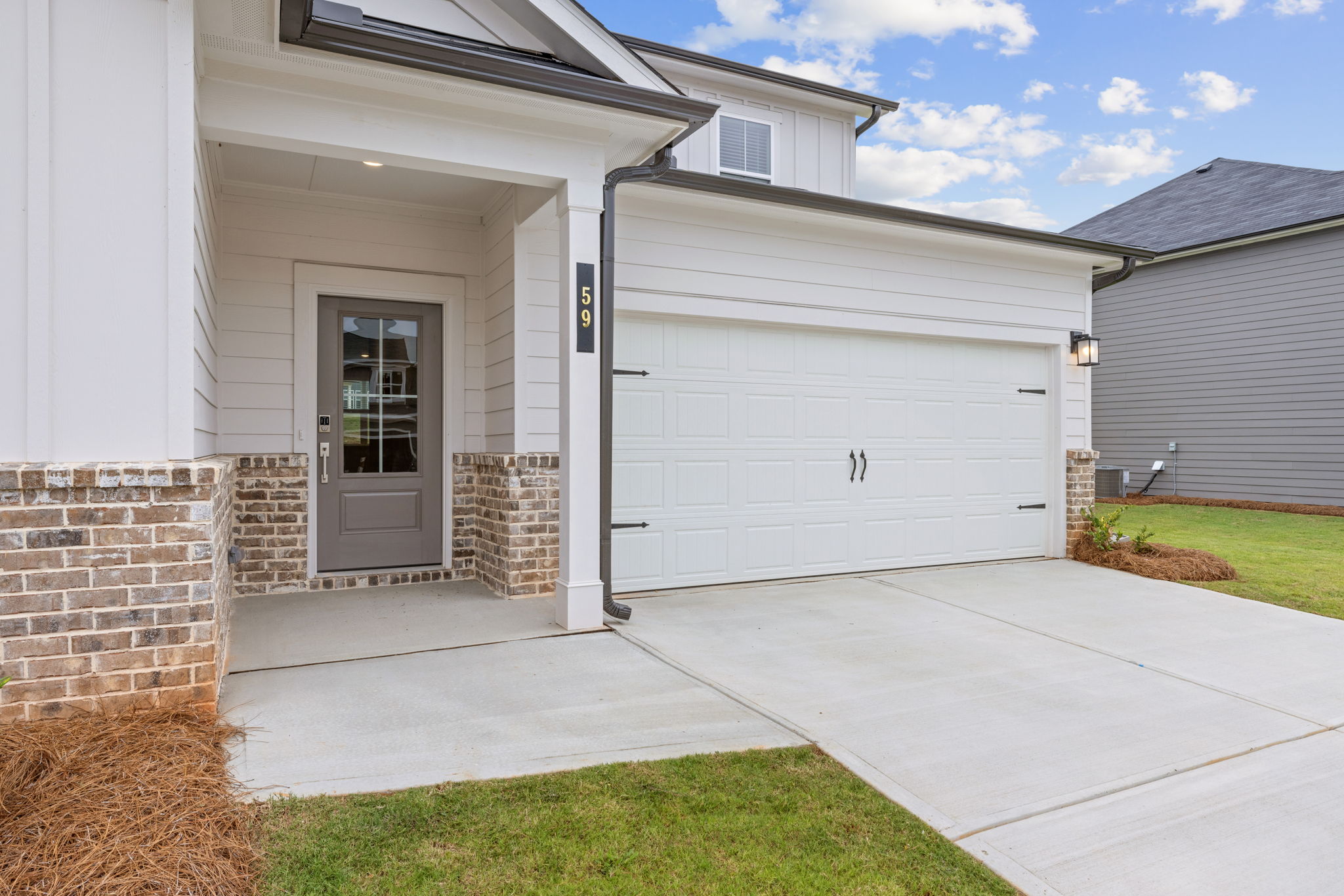 A garage with a white door.