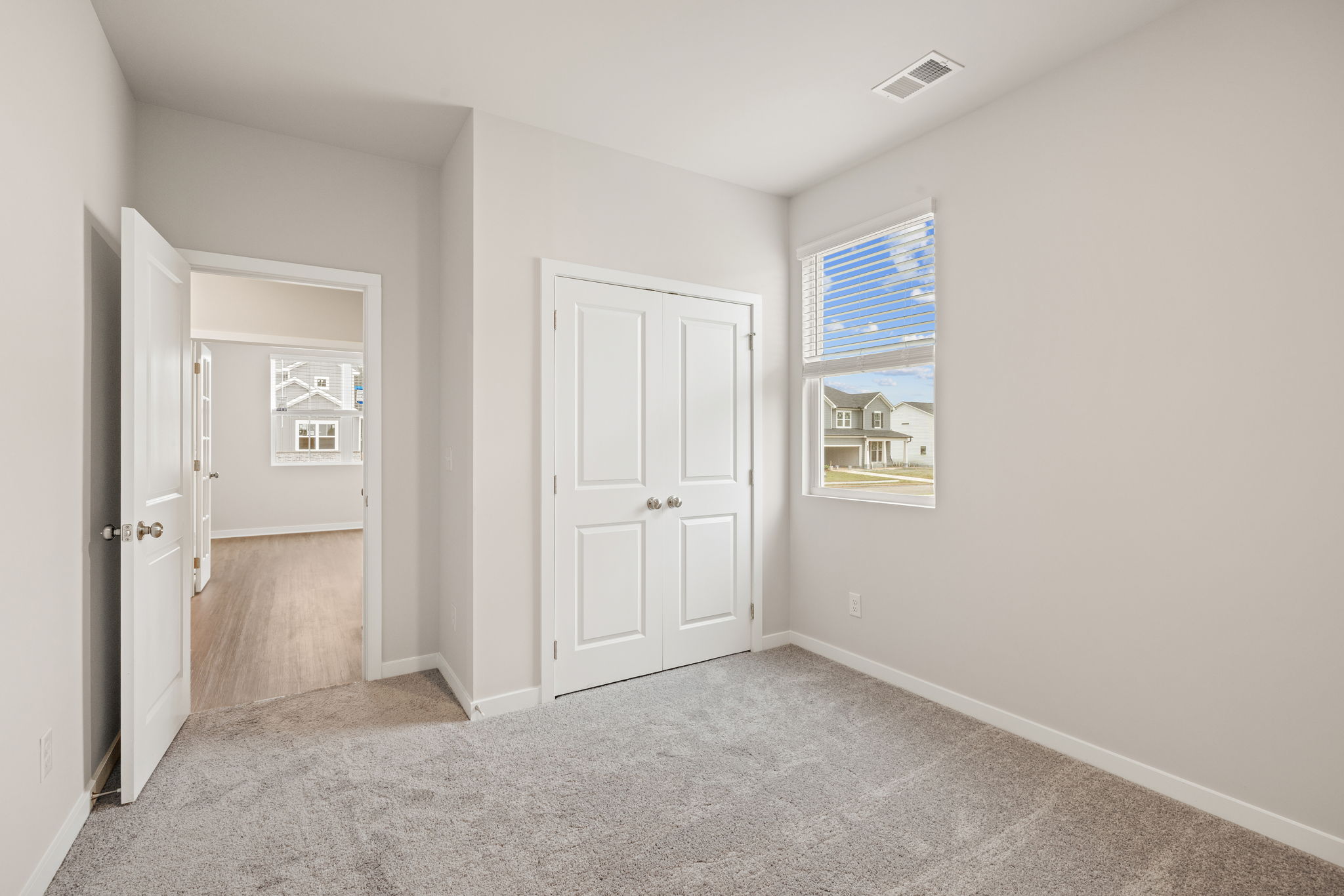 A room with white doors.