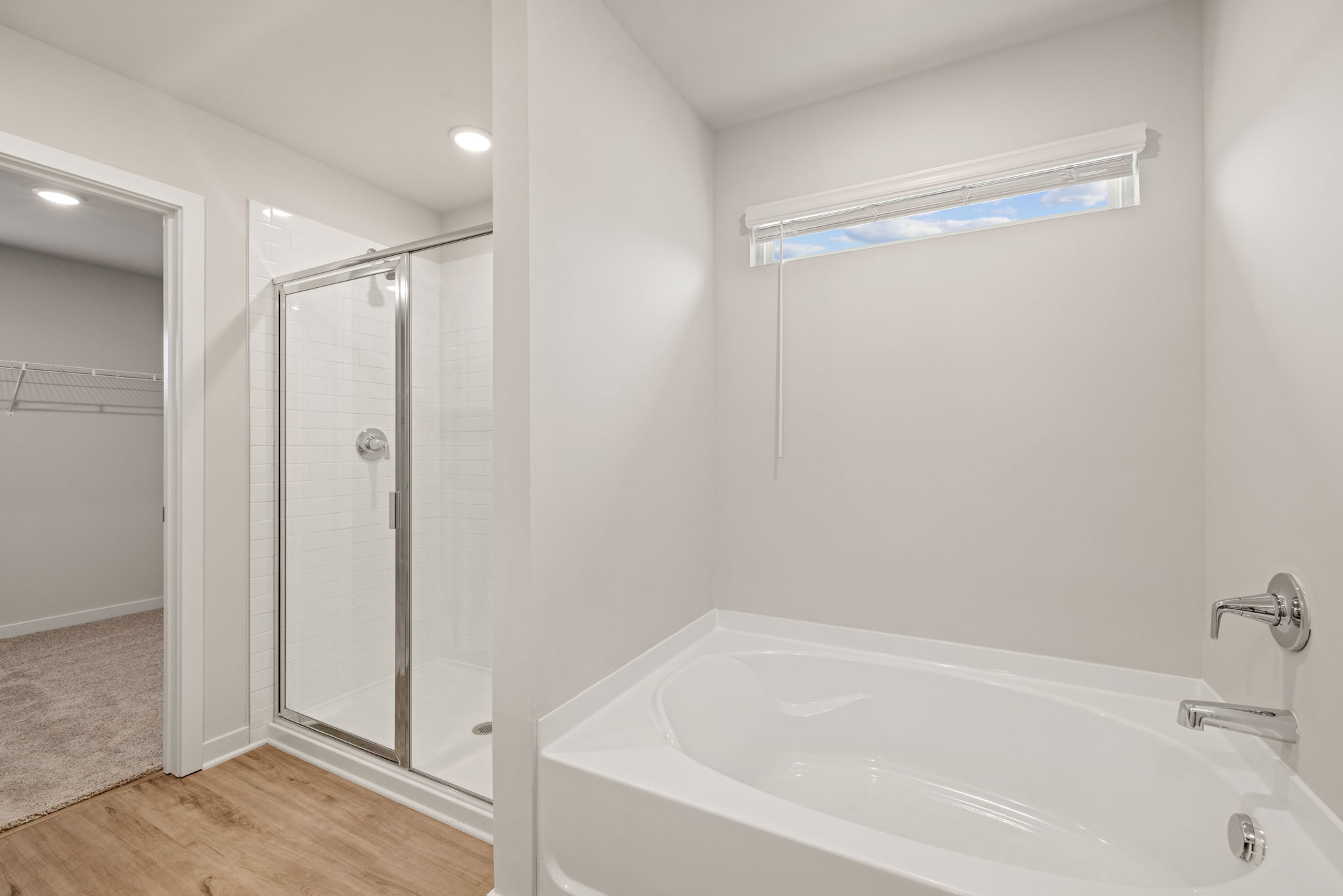 A bathroom with a glass shower.
