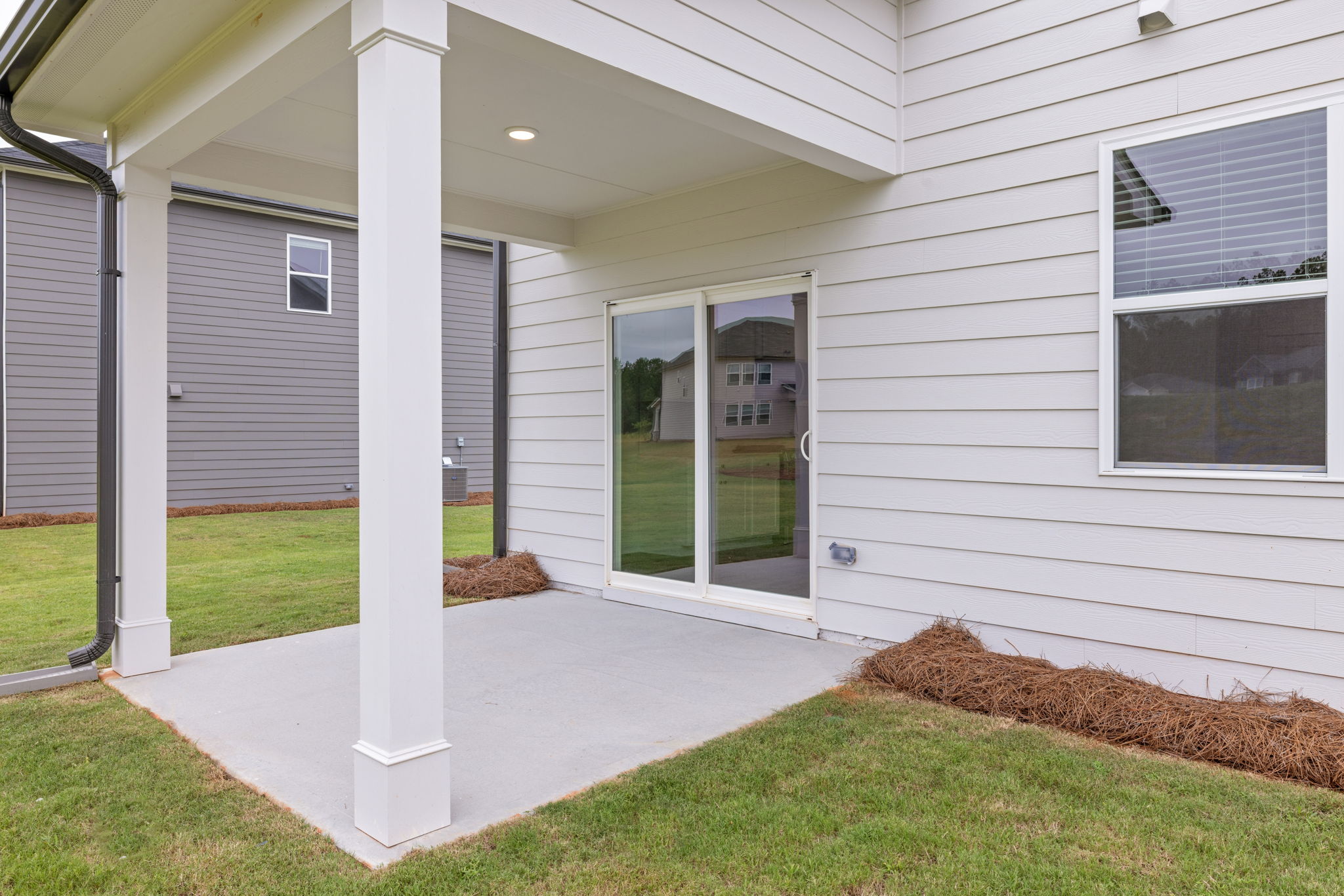 A house with a white porch.