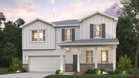 A white house with a lawn and trees in the front with Graceland in the background.