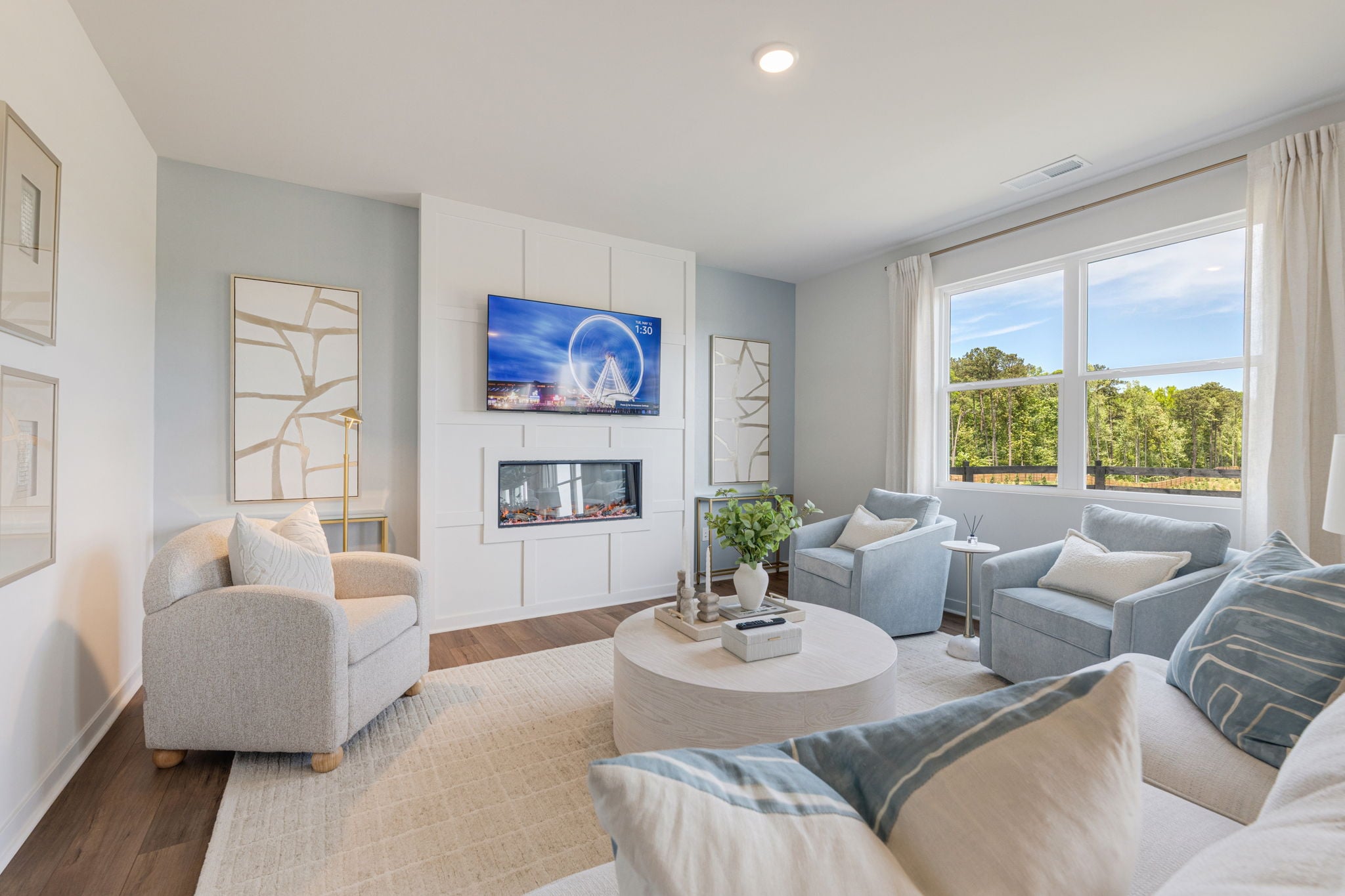 A living room with a large window.