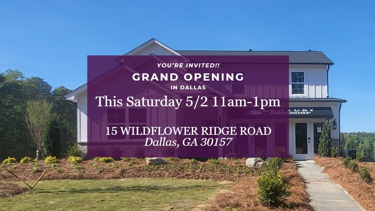 A large purple sign in front of a house.