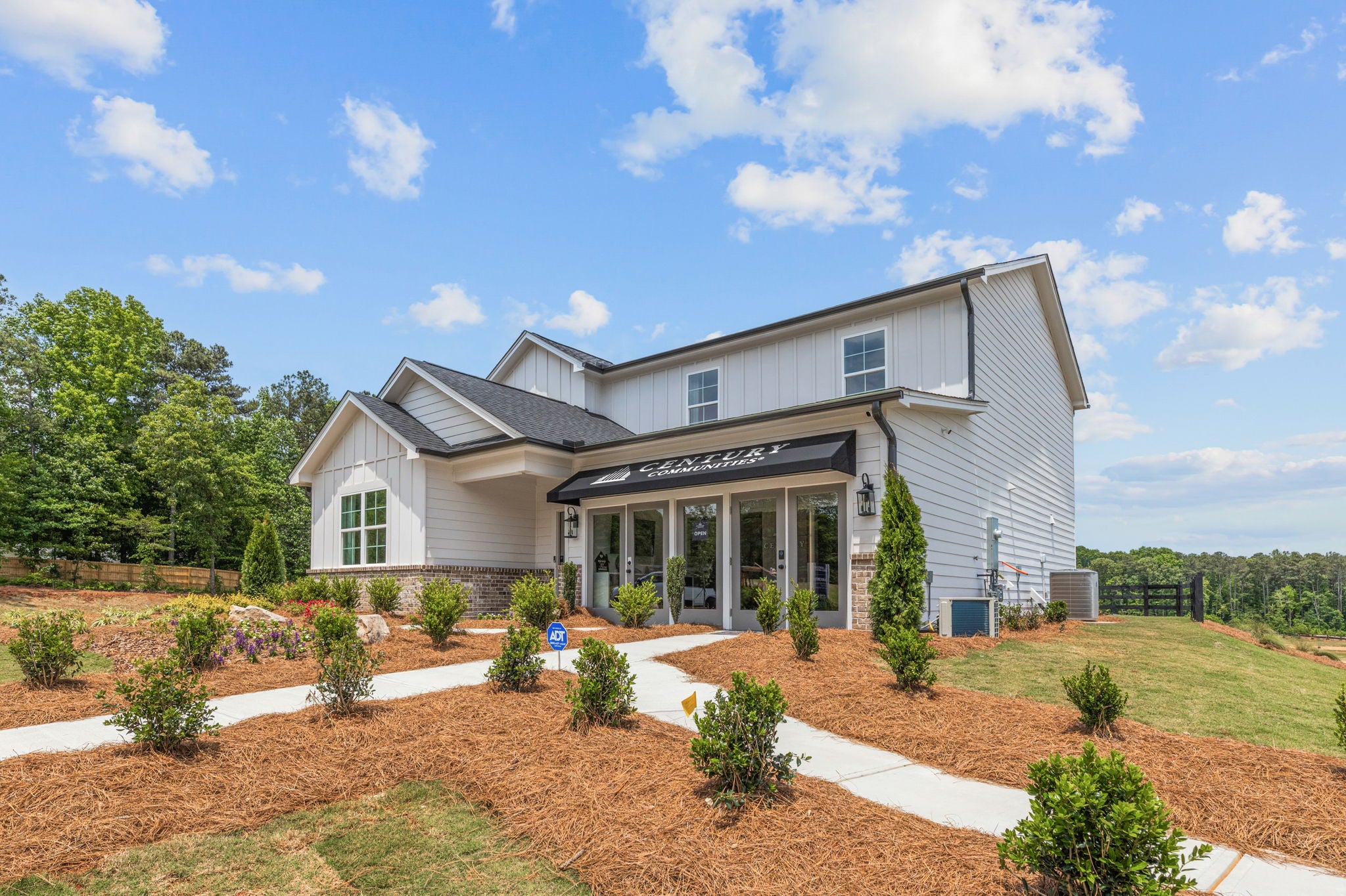 A house with a large front yard.