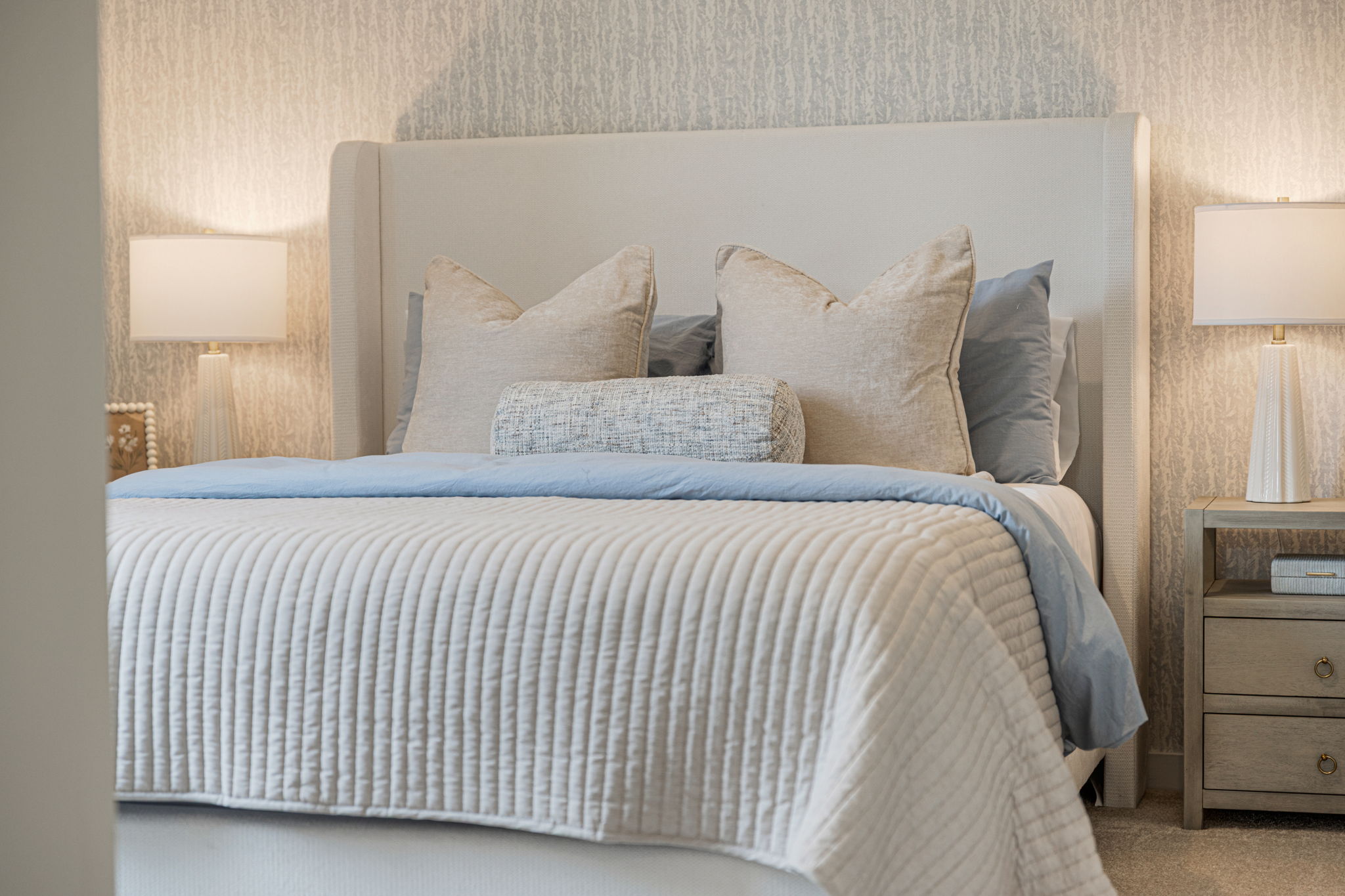 A bed with pillows.