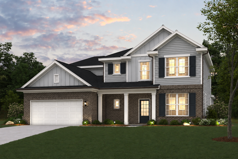 A house with a lawn in front.