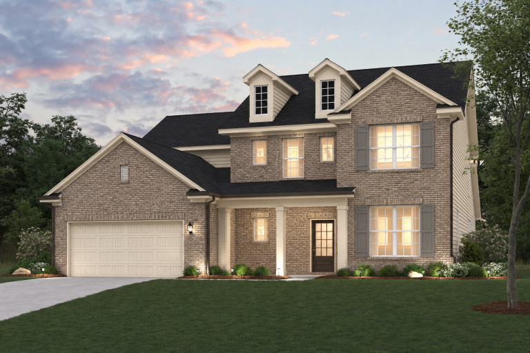 A house with a large front yard.