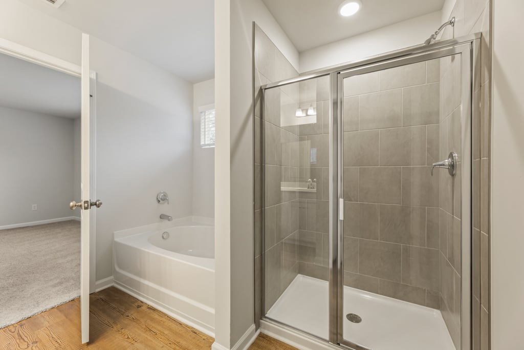 A bathroom with a glass shower.
