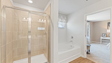 A bathroom with a glass shower.