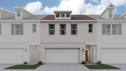 A white house with a garage.