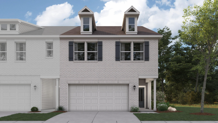 A house with a garage with Vandalia State House State Historic Site in the background.