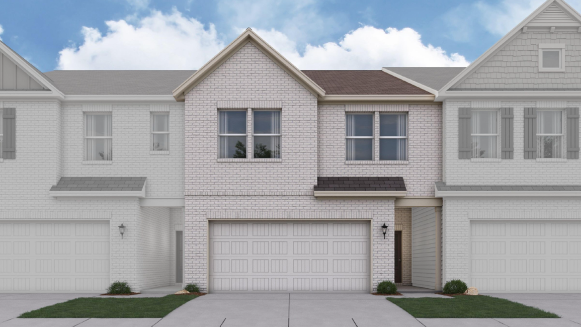 A white house with a garage.