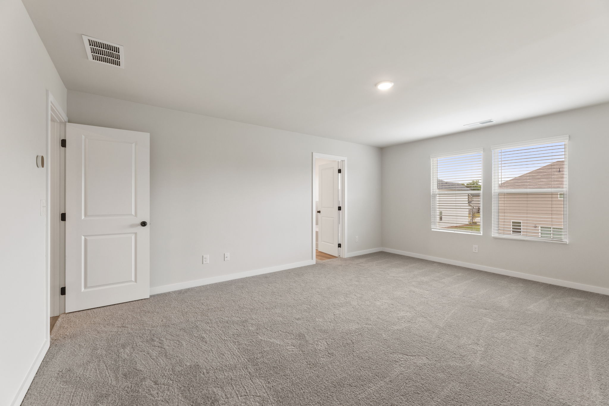 A room with white doors.