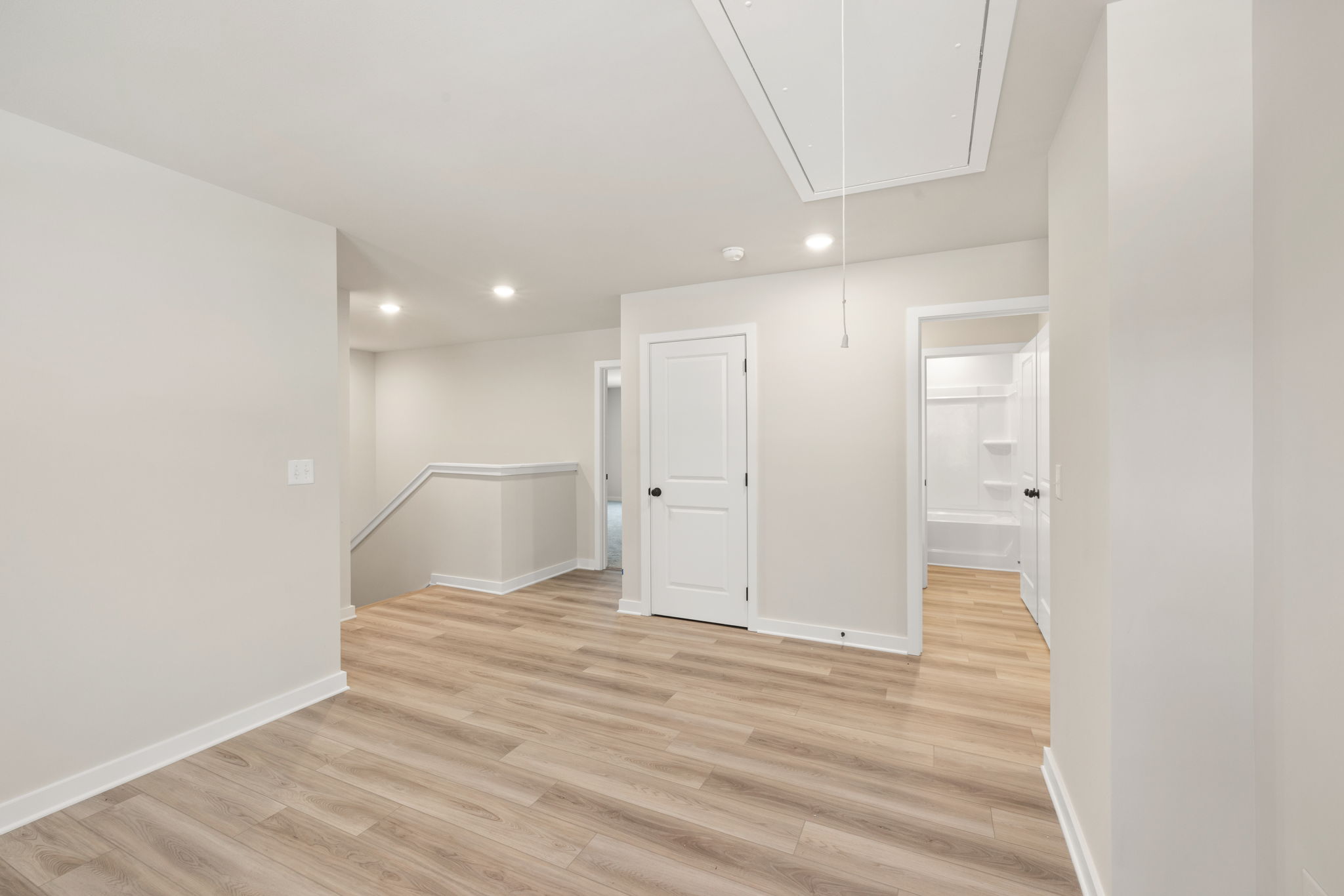 A room with white doors.