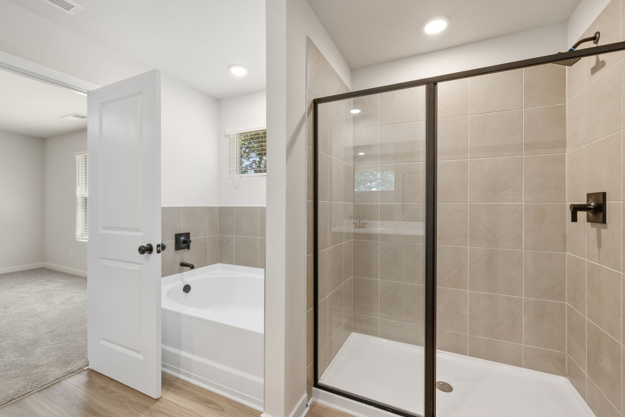 A bathroom with a glass shower.