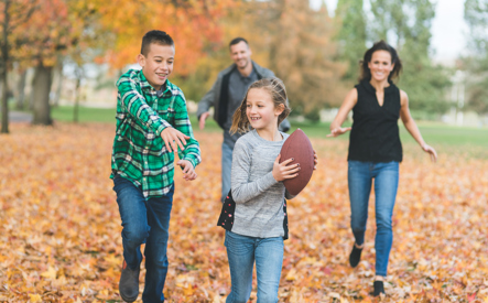 family playing football