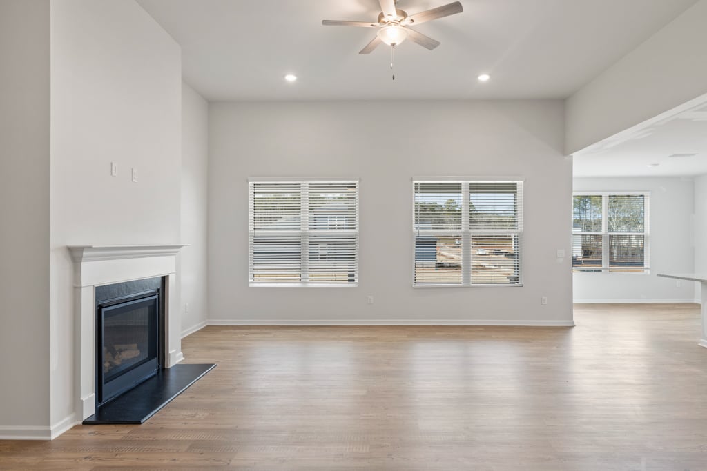A living room with a fireplace.