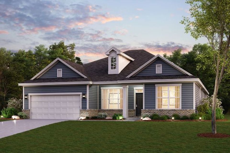 A house with a large front yard.