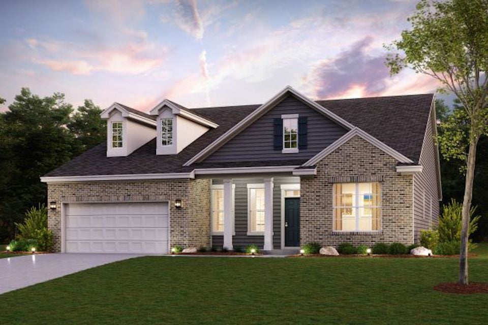 A house with a large front yard.