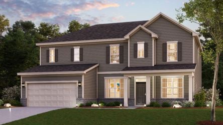 A house with a lawn in front of it.