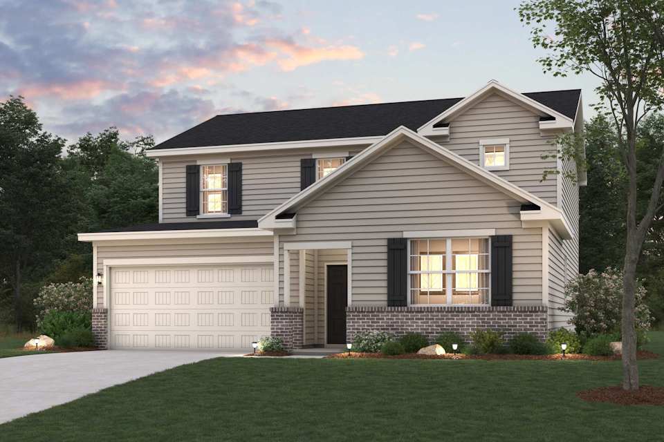 A house with a large front yard.