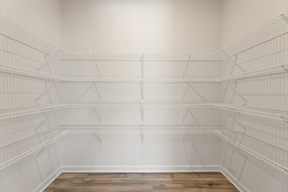 A white staircase with white railings.