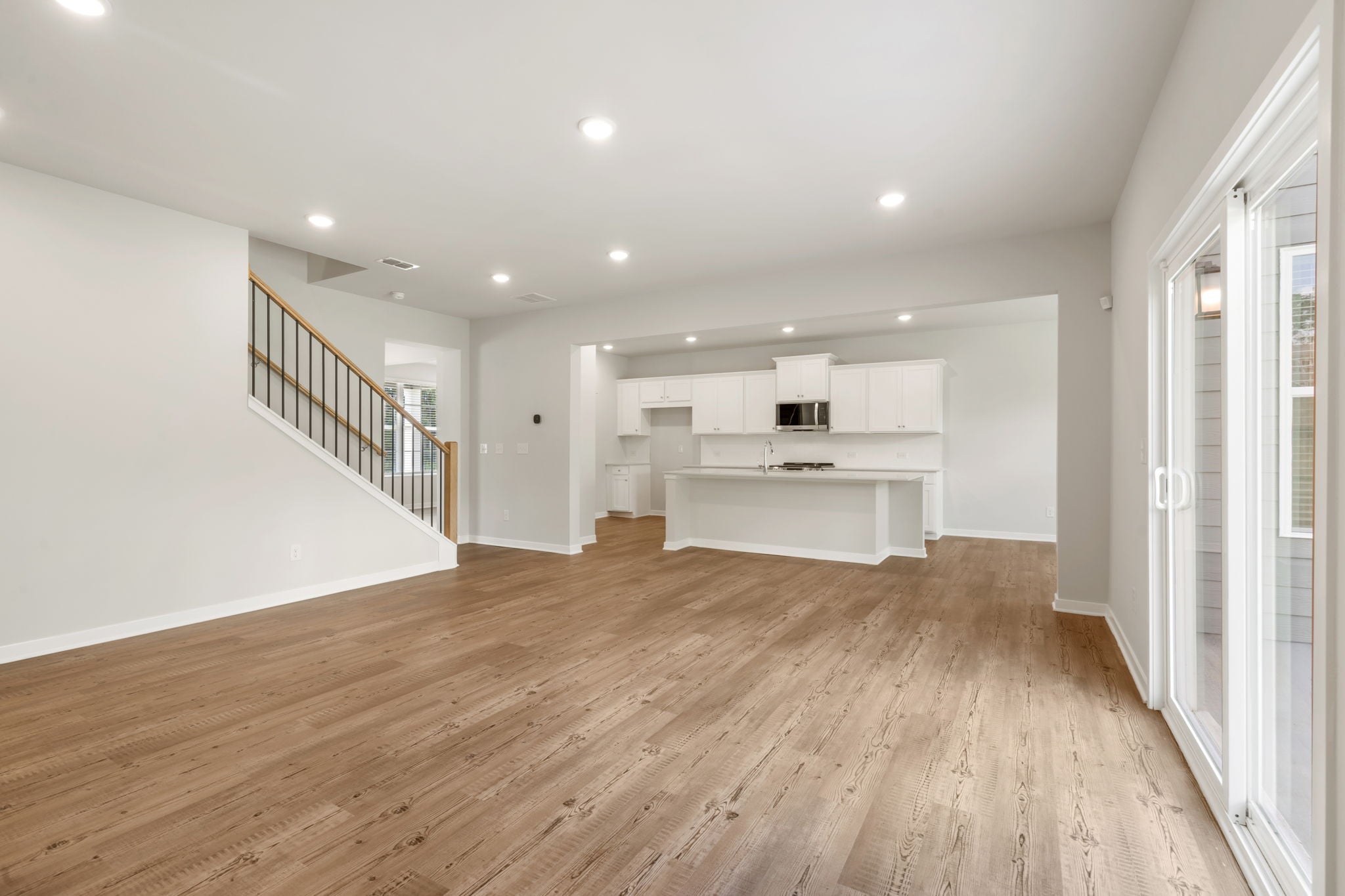 A large empty room with white walls.